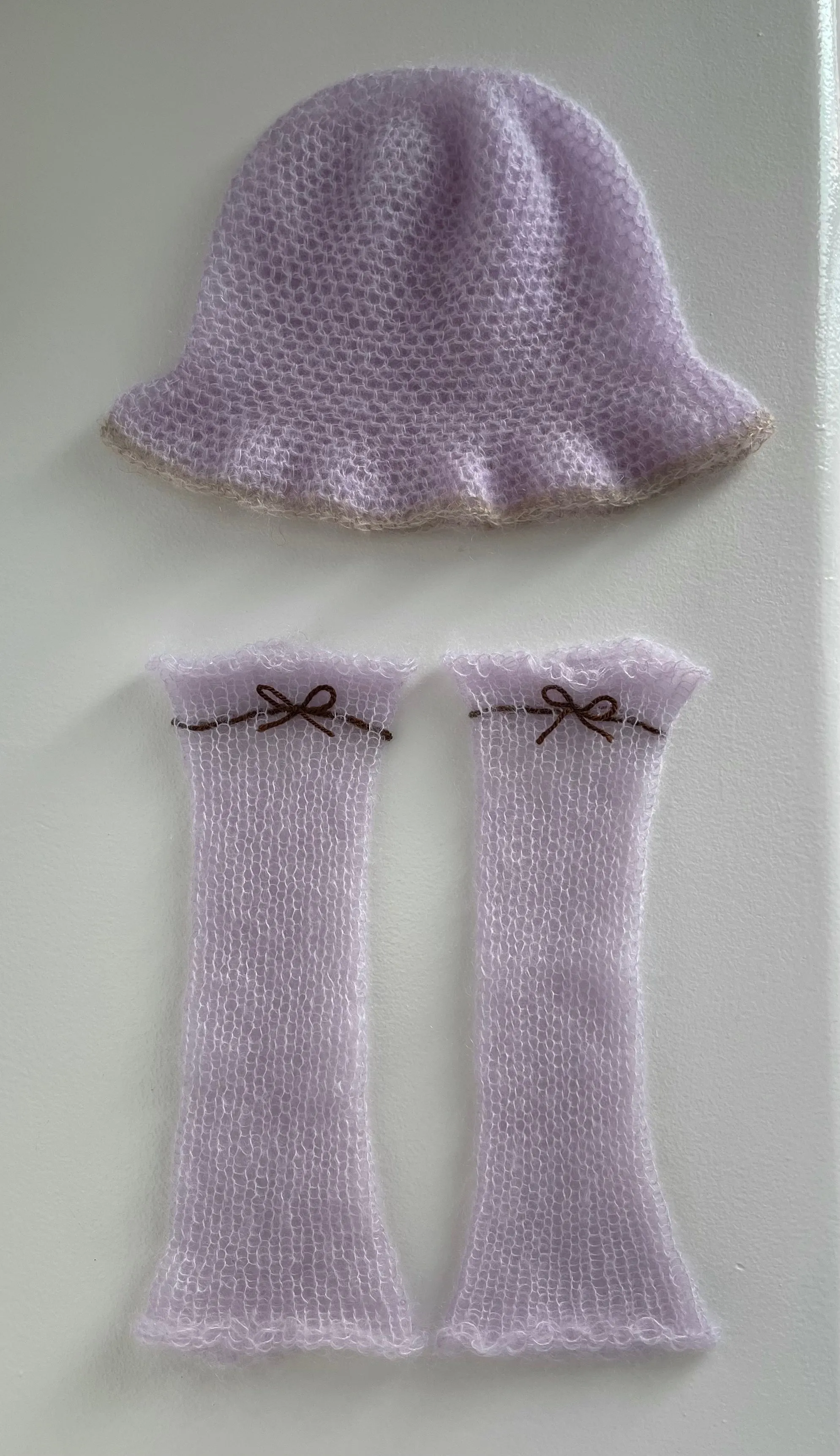 Handmade crochet mohair bucket hat in lilac with beige trim