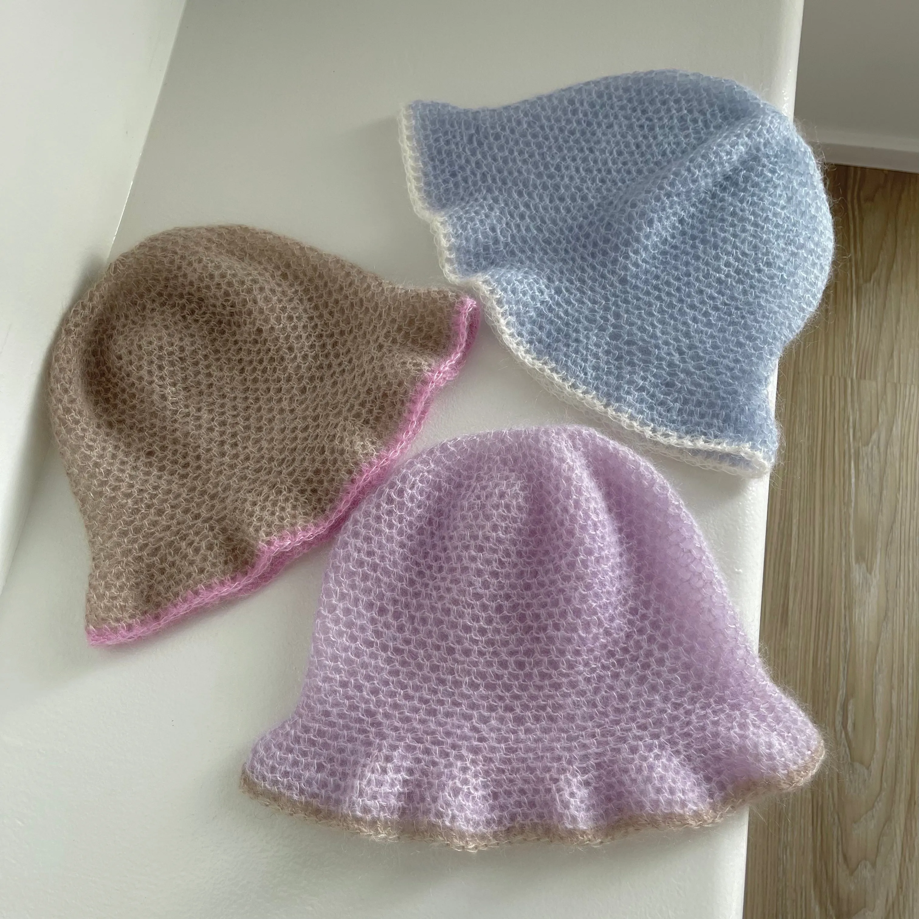 Handmade crochet mohair bucket hat in lilac with beige trim