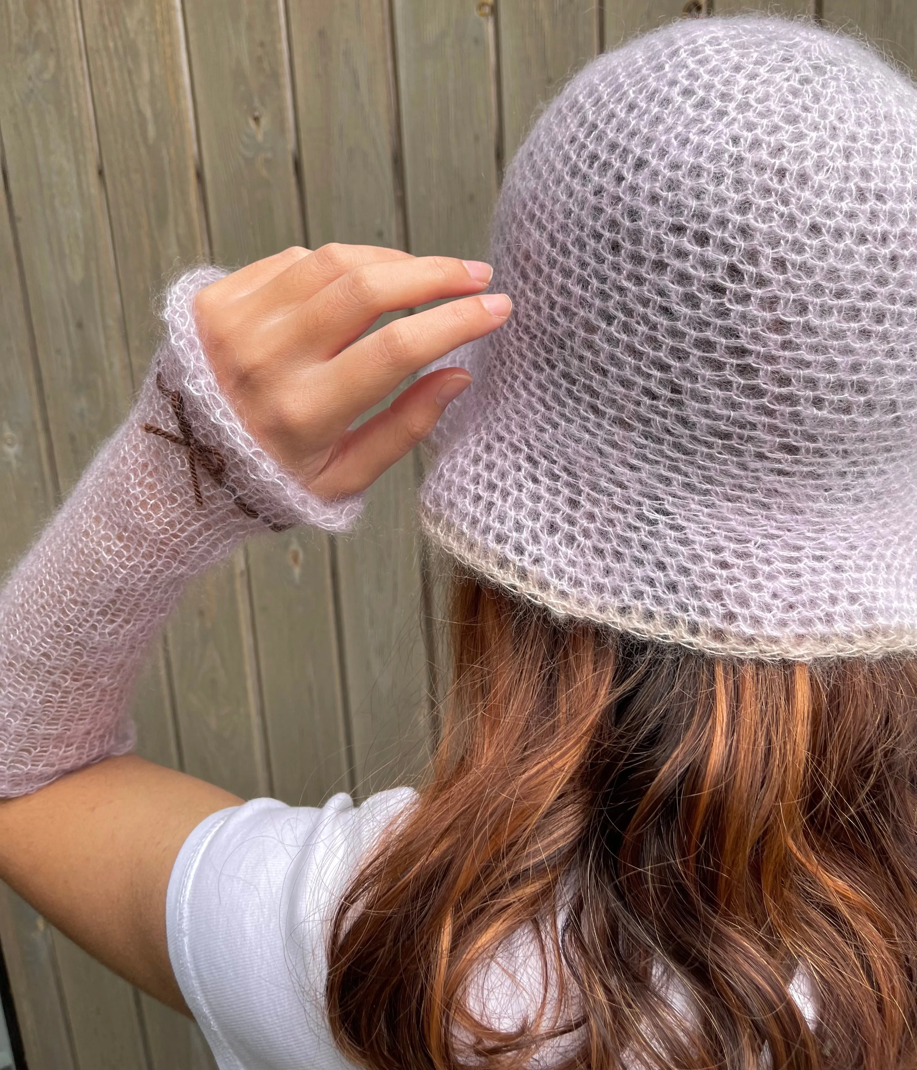 Handmade crochet mohair bucket hat in lilac with beige trim
