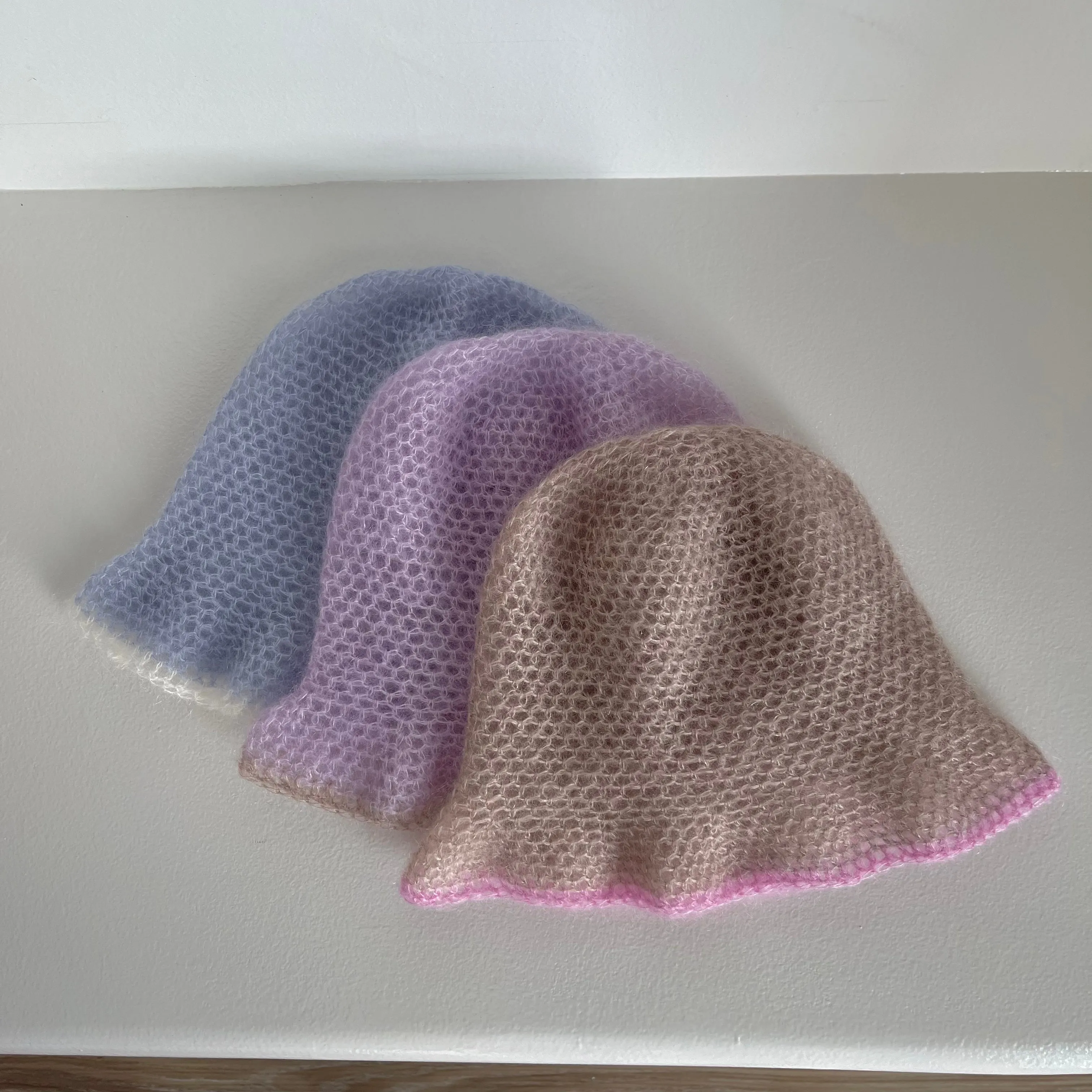 Handmade crochet mohair bucket hat in lilac with beige trim