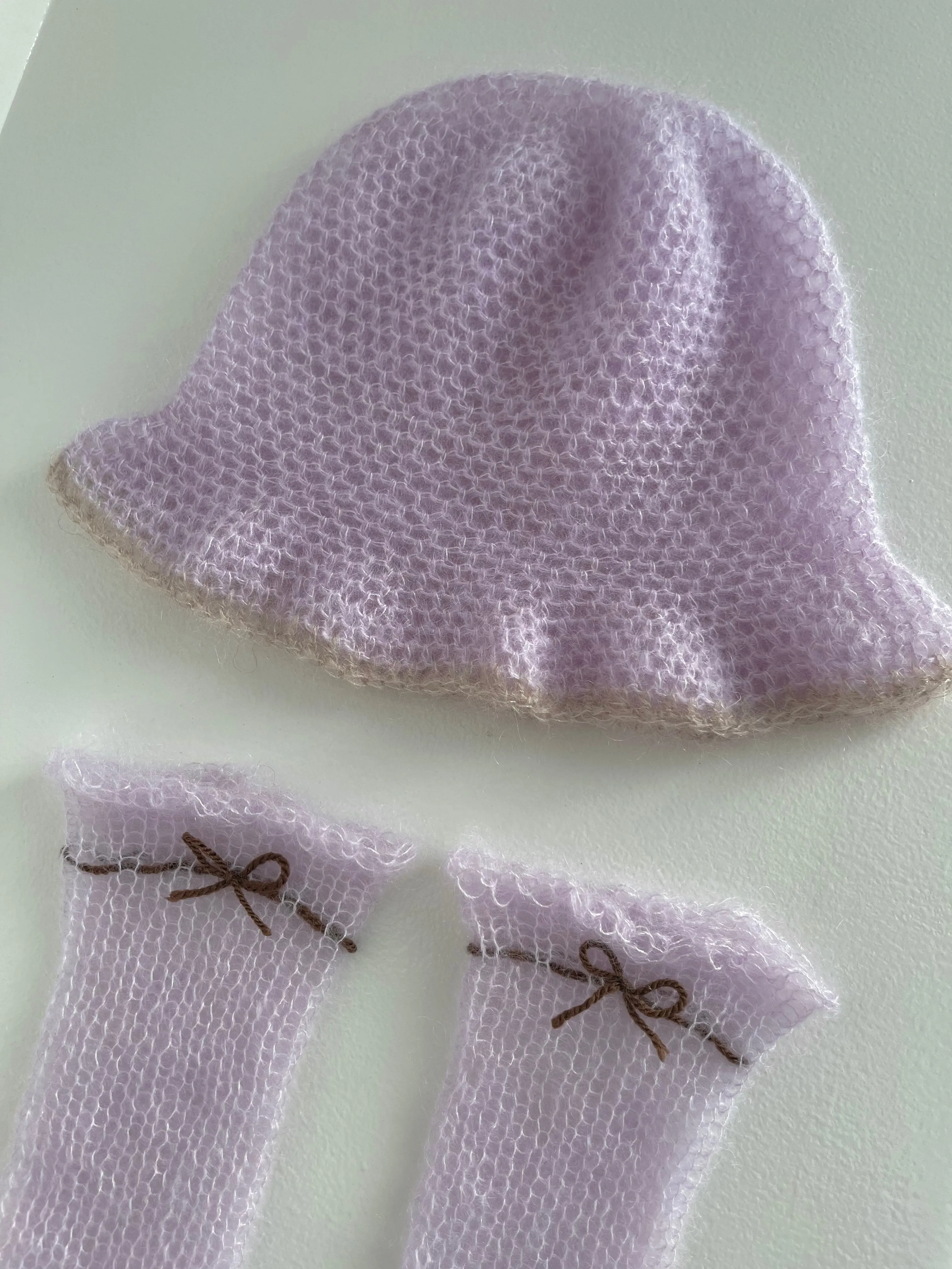 Handmade crochet mohair bucket hat in lilac with beige trim